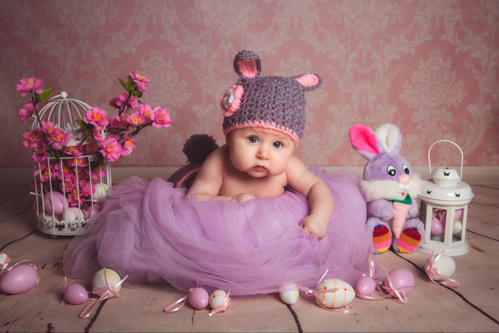 Creative props and backgrounds, adding magic to baby's photoshoot.
