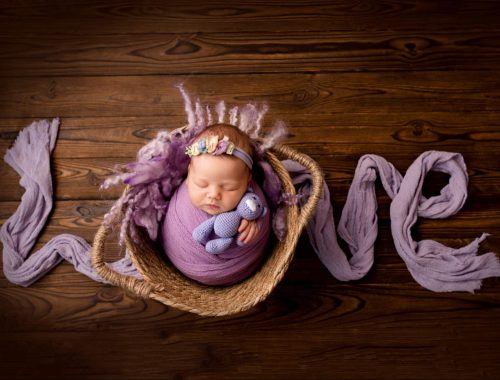 Baby boy with antique props