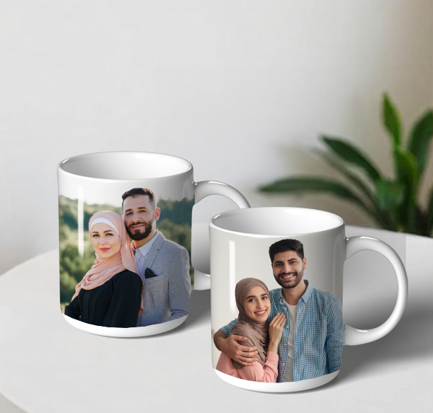 Two custom wedding mugs, personalized with names and a wedding date, placed on a chic breakfast table in a UAE setting, with a cozy view
